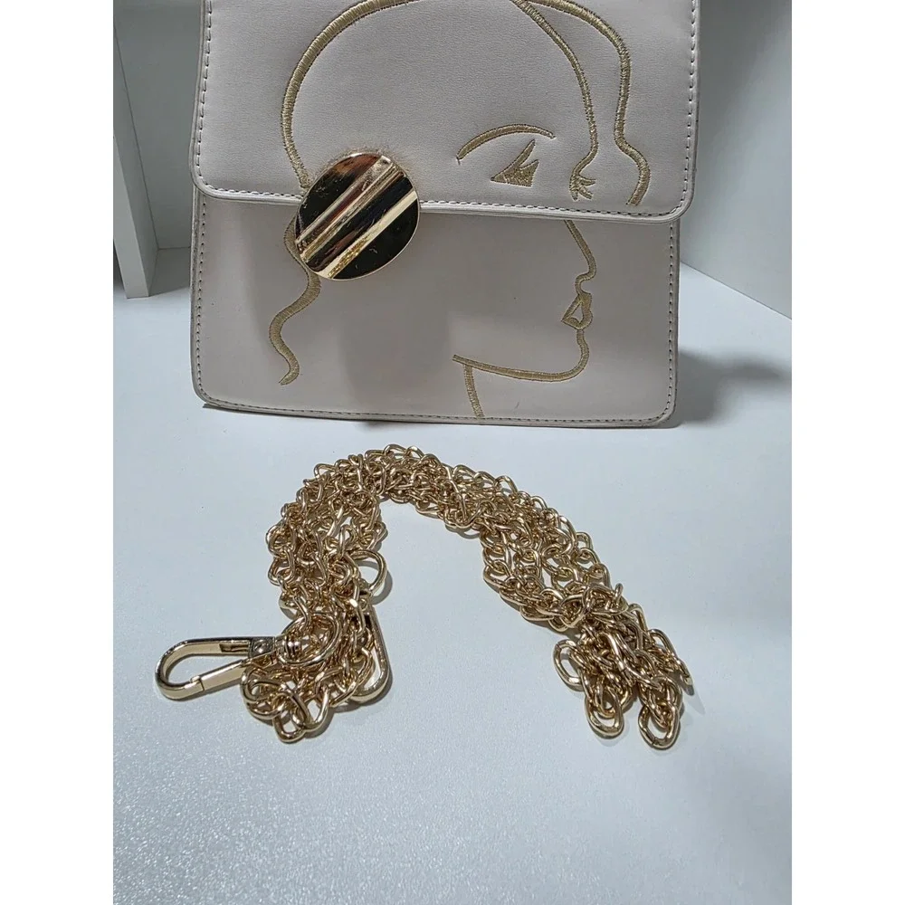White Structured Top Handle Purse Gold Embroidered Abstract Face Chain Strap Bag